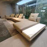 Fluid Curved Sectional Top-Grain Leather Sofa with Integrated Marble Side Platform